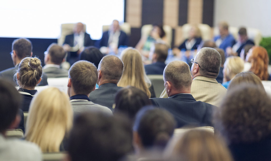 Group of professionals attending a meeting