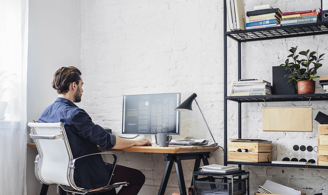 Young man working on his computer